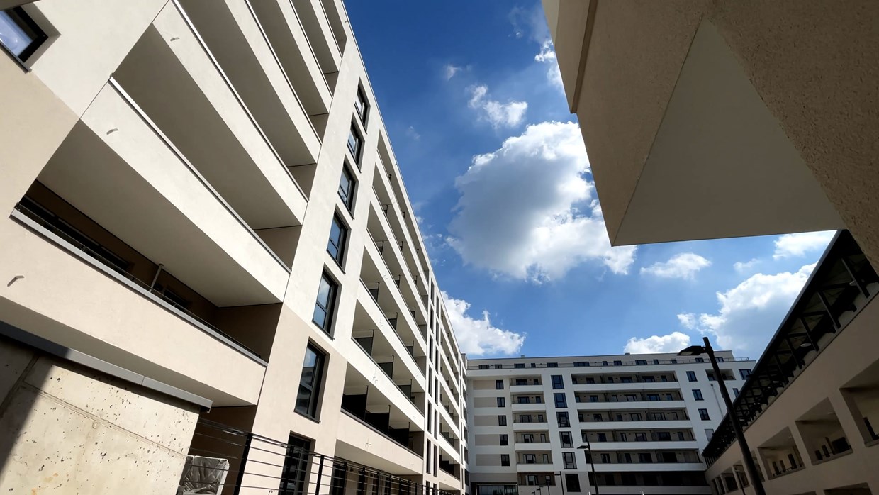 Architektonisch anmutendes Foto von einem Neubaukomplex des Schönhof-Viertels